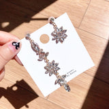 Design by Korean New Party Dangle　earrings Luxury Crystal Flower Asymmetric Drop Earrings - Uncommon Remington 