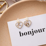 Sweet Transparent Wavelet Point Drop Earrings - Uncommon Remington 