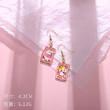 Korean design  Alice wonderland dangle earrings - Uncommon Remington 