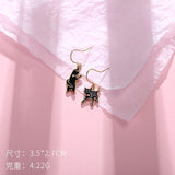 Korean design  Alice wonderland dangle earrings - Uncommon Remington 